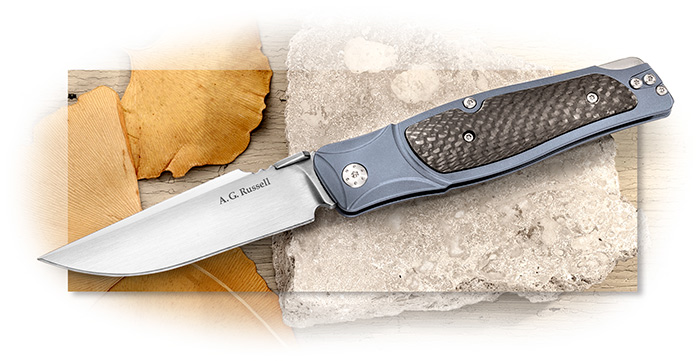 A.G. Russell Blue Lagoon Lockback - anodized blue titanium frame handle with carbon fiber inlay.