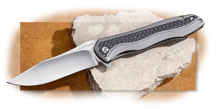 A.G. Russell Sinuate Titanium framelock folding knife with carbon fiber inlays & flipper deployment