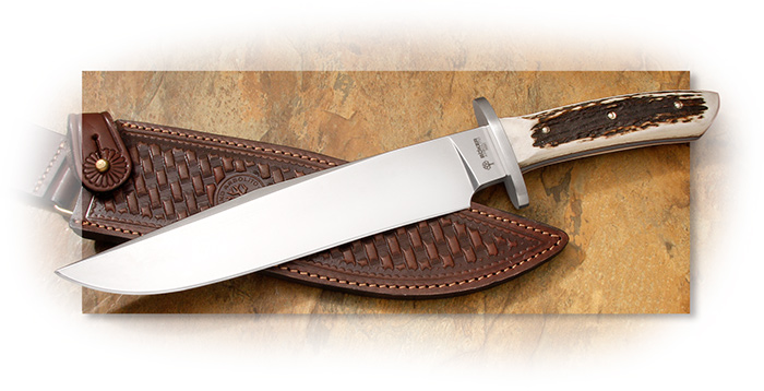 Boker Arbolito Stag Bowie Knife with Red Stag handles and tooled brown leather sheath