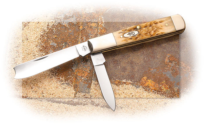Case Razor Peach Seed Jigged Amber Bone