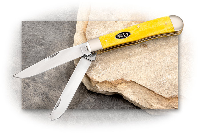 CASE - TRAPPER - SMOOTH YELLOW BONE TRU-SHARP STAINLESS STEEL BLADES - BLACK OVAL CASE SHEILD