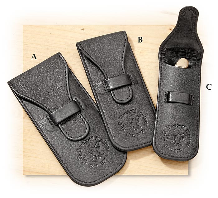 Small black leather knife pouches with A.G. Russell logo
